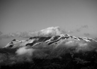 Swiss mountain peaks with clouds poster