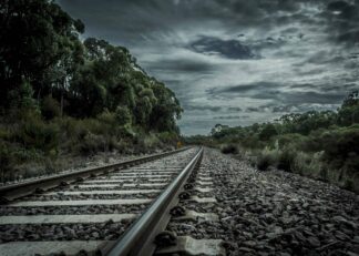 View of the train tracks into town poster