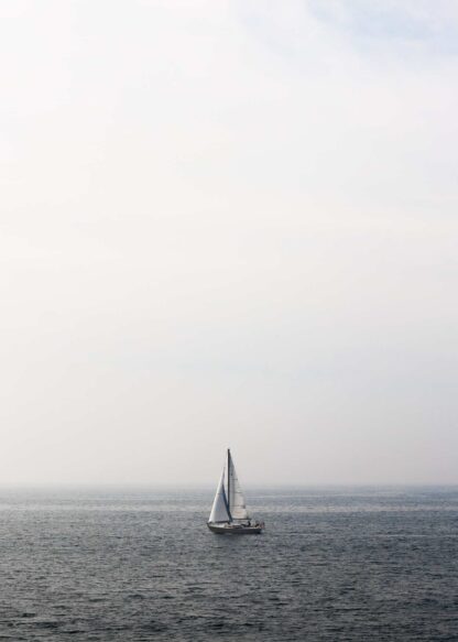 Sailing boat in the cloudy poster